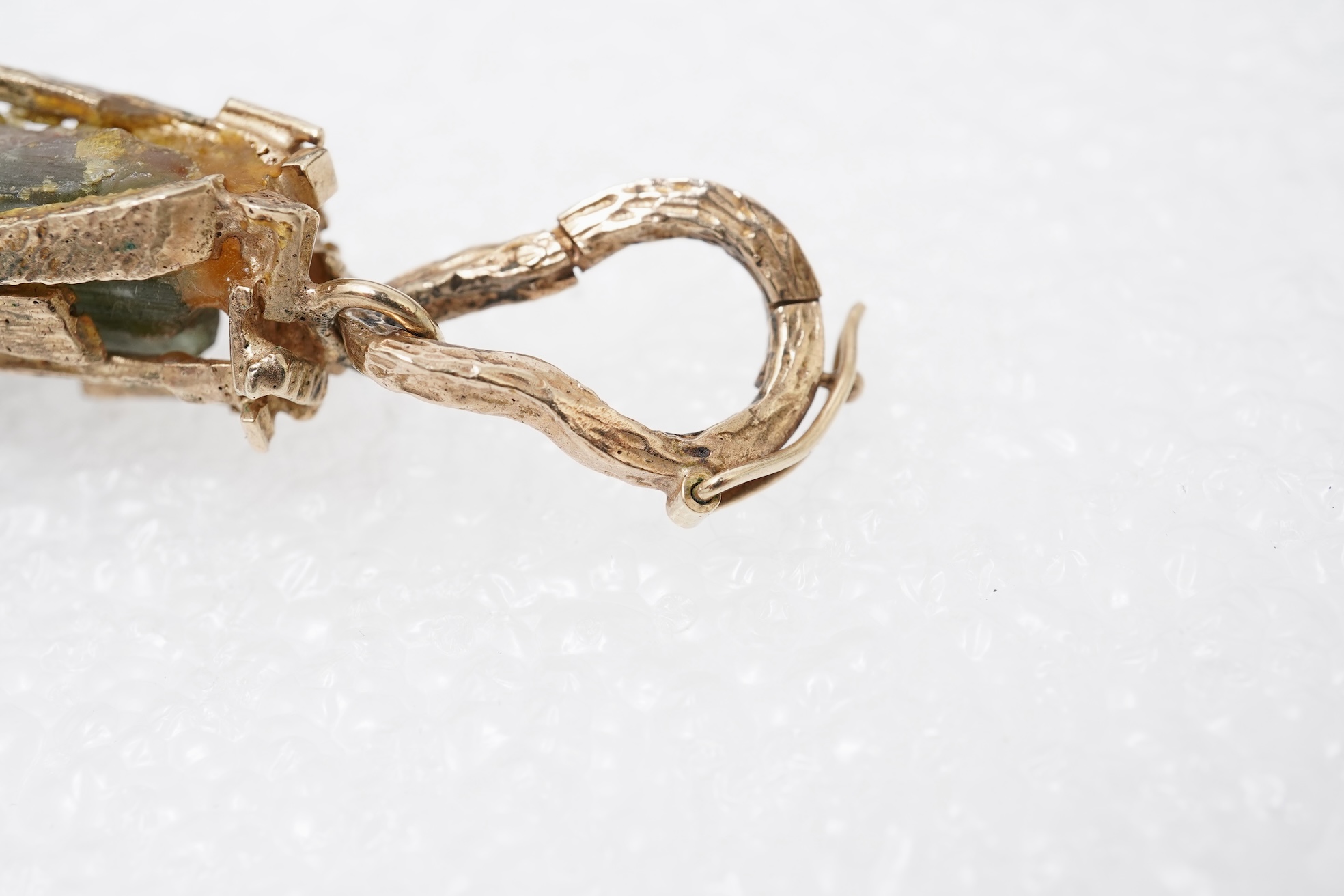 A gold and tourmaline crystal pendant, 1970s